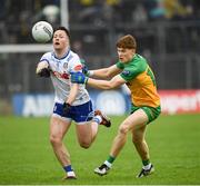 20 April 2025; Ryan Wylie of Monaghan in action against Ciaran Moore of Donegal during the Ulster GAA Football Senior Championship quarter-final match between Monaghan and Donegal at St Tiernach's Park in Clones, Monaghan. Photo by Philip Fitzpatrick/Sportsfile
