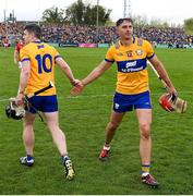 20 April 2025; Clare players from left, Tony Kelly shakes hands with teammate Peter Duggan after the Munster GAA Hurling Senior Championship Round 1 match between Clare and Cork at Zimmer Biomet Páirc Chíosóg in Ennis, Clare. Photo by John Sheridan/Sportsfile