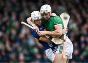 20 April 2025; Aaron Gillane of Limerick tussles with Michael Breen of Tipperary during the Munster GAA Hurling Senior Championship Round 1 match between Tipperary and Limerick at FBD Semple Stadium in Thurles, Tipperary. Photo by Seb Daly/Sportsfile