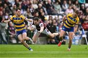 20 April 2025; Cein Darcy of Galway in action against Brian Stack, left, and Ultan Harney of Roscommon during the Connacht GAA Football Senior Championship semi-final match between Galway and Roscommon at Pearse Stadium in Galway. Photo by Piaras Ó Mídheach/Sportsfile