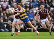 20 April 2025; Cein Darcy of Galway in action against Ultan Harney of Roscommon during the Connacht GAA Football Senior Championship semi-final match between Galway and Roscommon at Pearse Stadium in Galway. Photo by Piaras Ó Mídheach/Sportsfile