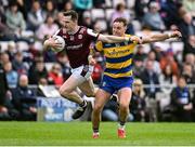 20 April 2025; Cein Darcy of Galway in action against Ultan Harney of Roscommon during the Connacht GAA Football Senior Championship semi-final match between Galway and Roscommon at Pearse Stadium in Galway. Photo by Piaras Ó Mídheach/Sportsfile