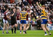 20 April 2025; The referee Seán Hurson with Ultan Harney of Roscommon, 10, during the Connacht GAA Football Senior Championship semi-final match between Galway and Roscommon at Pearse Stadium in Galway. Photo by Piaras Ó Mídheach/Sportsfile