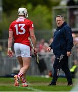 20 April 2025; Cork manager Pat Ryan watches as Patrick Horgan leaves the pitch upon being substituted during the Munster GAA Hurling Senior Championship Round 1 match between Clare and Cork at Zimmer Biomet Páirc Chíosóg in Ennis, Clare. Photo by Brendan Moran/Sportsfile