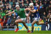 20 April 2025; Kyle Hayes of Limerick in action against Craig Morgan of Tipperary during the Munster GAA Hurling Senior Championship Round 1 match between Tipperary and Limerick at FBD Semple Stadium in Thurles, Tipperary. Photo by Seb Daly/Sportsfile