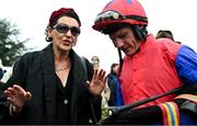 20 April 2025; Jockey Paul Townend speaks to a winning connection after winning The Irish Stallion Farms EBF Honeysuckle Mares Novice Hurdle (Grade 1) on Aurora Vega during day two of the Fairyhouse Easter Festival at Fairyhouse Racecourse in Ratoath, Meath. Photo by Shauna Clinton/Sportsfile