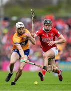 20 April 2025; Ryan Taylor of Clare contests possession with Darragh Fitzgibbon of Cork during the Munster GAA Hurling Senior Championship Round 1 match between Clare and Cork at Zimmer Biomet Páirc Chíosóg in Ennis, Clare. Photo by Brendan Moran/Sportsfile