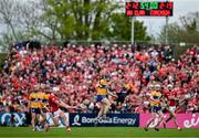 20 April 2025; Patrick Horgan of Cork attempts a shot  for a point despite the attentions of David McInerney of Clare during the Munster GAA Hurling Senior Championship Round 1 match between Clare and Cork at Zimmer Biomet Páirc Chíosóg in Ennis, Clare. Photo by Brendan Moran/Sportsfile