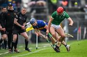 20 April 2025; Alan Tynan of Tipperary in action against Colin Coughlan of Limerick during the Munster GAA Hurling Senior Championship Round 1 match between Tipperary and Limerick at FBD Semple Stadium in Thurles, Tipperary. Photo by Seb Daly/Sportsfile