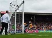 20 April 2025; Clare goalkeeper Eibhear Quilligan saves a shot from Alan Connolly of Cork during the Munster GAA Hurling Senior Championship Round 1 match between Clare and Cork at Zimmer Biomet Páirc Chíosóg in Ennis, Clare. Photo by Brendan Moran/Sportsfile