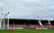 20 April 2025; Aidan McCarthy of Clare scores his side's first goal past Patrick Collins of Cork during the Munster GAA Hurling Senior Championship Round 1 match between Clare and Cork at Zimmer Biomet Páirc Chíosóg in Ennis, Clare. Photo by Brendan Moran/Sportsfile