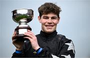 20 April 2025; Jockey Josh Williamson celebrates with the cup after winning The Tattersalls Ireland George Mernagh Memorial Sales Bumper on I'm Slippy during day two of the Fairyhouse Easter Festival at Fairyhouse Racecourse in Ratoath, Meath. Photo by Shauna Clinton/Sportsfile