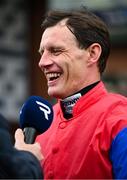 20 April 2025; Jockey Paul Townend is interviewed by Racing TV after winning The Irish Stallion Farms EBF Honeysuckle Mares Novice Hurdle (Grade 1) on Aurora Vega during day two of the Fairyhouse Easter Festival at Fairyhouse Racecourse in Ratoath, Meath. Photo by Shauna Clinton/Sportsfile