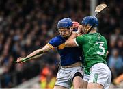 20 April 2025; John McGrath of Tipperary in action against Michael Casey of Limerick during the Munster GAA Hurling Senior Championship Round 1 match between Tipperary and Limerick at FBD Semple Stadium in Thurles, Tipperary. Photo by Seb Daly/Sportsfile