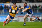 19 April 2025; Keelan Sexton of Clare is tackled by Jimmy Feehan of Tipperary during the Munster GAA Football Senior Championship semi-final match between Clare and Tipperary at Zimmer Biomet Cusack Park in Ennis, Clare. Photo by Tom Beary/Sportsfile