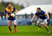19 April 2025; Keelan Sexton of Clare in action against Jason Madigan of Tipperary during the Munster GAA Football Senior Championship semi-final match between Clare and Tipperary at Zimmer Biomet Cusack Park in Ennis, Clare. Photo by Tom Beary/Sportsfile