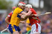 20 April 2025; Patrick Horgan of Cork in action against Conor Leen of Clare during the Munster GAA Hurling Senior Championship Round 1 match between Clare and Cork at Zimmer Biomet Páirc Chíosóg in Ennis, Clare. Photo by John Sheridan/Sportsfile