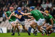 20 April 2025; John McGrath of Tipperary in action against Michael Casey of Limerick, right, during the Munster GAA Hurling Senior Championship Round 1 match between Tipperary and Limerick at FBD Semple Stadium in Thurles, Tipperary. Photo by Seb Daly/Sportsfile