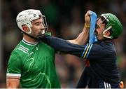 20 April 2025; Aaron Gillane of Limerick tussles with Tipperary goalkeeper Barry Hogan during the Munster GAA Hurling Senior Championship Round 1 match between Tipperary and Limerick at FBD Semple Stadium in Thurles, Tipperary. Photo by Seb Daly/Sportsfile