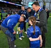19 April 2025; Leinster mascots Muireann Cullen with Cian Healy of Leinster before the United Rugby Championship match between Leinster and Ulster at the Aviva Stadium in Dublin. Photo by Brendan Moran/Sportsfile
