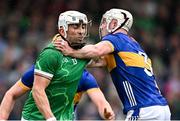 20 April 2025; Aaron Gillane of Limerick is tackled by Eoghan Connolly of Tipperary during the Munster GAA Hurling Senior Championship Round 1 match between Tipperary and Limerick at FBD Semple Stadium in Thurles, Tipperary. Photo by Seb Daly/Sportsfile
