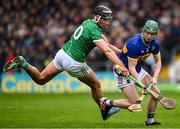 20 April 2025; Darragh Stakelum of Tipperary in action against Gearoid Hegarty of Limerick during the Munster GAA Hurling Senior Championship Round 1 match between Tipperary and Limerick at FBD Semple Stadium in Thurles, Tipperary. Photo by Seb Daly/Sportsfile
