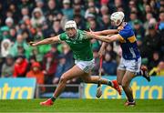 20 April 2025; Kyle Hayes of Limerick in action against Craig Morgan of Tipperary during the Munster GAA Hurling Senior Championship Round 1 match between Tipperary and Limerick at FBD Semple Stadium in Thurles, Tipperary. Photo by Seb Daly/Sportsfile