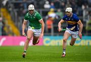 20 April 2025; Kyle Hayes of Limerick in action against Bryan O'Mara of Tipperary during the Munster GAA Hurling Senior Championship Round 1 match between Tipperary and Limerick at FBD Semple Stadium in Thurles, Tipperary. Photo by Seb Daly/Sportsfile