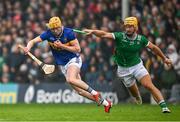 20 April 2025; Michael Breen of Tipperary in action against Tom Morrissey of Limerick during the Munster GAA Hurling Senior Championship Round 1 match between Tipperary and Limerick at FBD Semple Stadium in Thurles, Tipperary. Photo by Seb Daly/Sportsfile