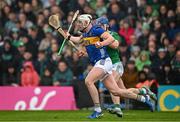 20 April 2025; Eoghan Connolly of Tipperary in action against Shane O’Brien of Limerick during the Munster GAA Hurling Senior Championship Round 1 match between Tipperary and Limerick at FBD Semple Stadium in Thurles, Tipperary. Photo by Seb Daly/Sportsfile