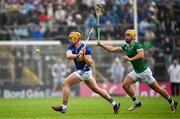 20 April 2025; Ronan Maher of Tipperary in action against Tom Morrissey of Limerick during the Munster GAA Hurling Senior Championship Round 1 match between Tipperary and Limerick at FBD Semple Stadium in Thurles, Tipperary. Photo by Seb Daly/Sportsfile