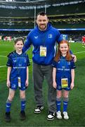 19 April 2025; Leinster mascots Muireann Cullen, left, and Anna Quirke with Cian Healy of Leinster before the United Rugby Championship match between Leinster and Ulster at the Aviva Stadium in Dublin. Photo by Brendan Moran/Sportsfile