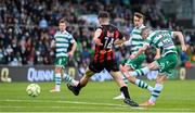21 April 2025; Jack Byrne of Shamrock Rovers has an attempt on goal despite the efforts of James McManus of Bohemians during the SSE Airtricity Men's Premier Division match between Shamrock Rovers and Bohemians at Tallaght Stadium in Dublin. Photo by Stephen McCarthy/Sportsfile