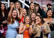 21 April 2025; Racegoers react during the Farmhouse Foods Novice Handicap Hurdle on day three of the Fairyhouse Easter Festival at Fairyhouse Racecourse in Ratoath, Meath. Photo by David Fitzgerald/Sportsfile