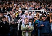 21 April 2025; Catherine Norman, age 7, from Downpatrick on her father Danny's shoulders cheers on the horses as they pass during the Farmhouse Foods Novice Handicap Hurdle on day three of the Fairyhouse Easter Festival at Fairyhouse Racecourse in Ratoath, Meath. Photo by David Fitzgerald/Sportsfile