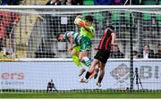 21 April 2025; Shamrock Rovers goalkeeper Ed McGinty makes a save ahead of team-mate Lee Grace and James Clarke of Bohemians during the SSE Airtricity Men's Premier Division match between Shamrock Rovers and Bohemians at Tallaght Stadium in Dublin. Photo by Stephen McCarthy/Sportsfile