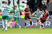 21 April 2025; Rhys Brennan of Bohemians, right, shoots to score his side's third goal during the SSE Airtricity Men's Premier Division match between Shamrock Rovers and Bohemians at Tallaght Stadium in Dublin. Photo by Stephen McCarthy/Sportsfile
