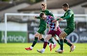 21 April 2025; Conor Kane of Drogheda is tackled by Chris Forrester, left, and Zach Elbouzedi of St Patrick's Athletic during the SSE Airtricity Men's Premier Division match between Drogheda United and St Patrick's Athletic at Sullivan & Lambe Park in Drogheda, Louth. Photo by Shauna Clinton/Sportsfile