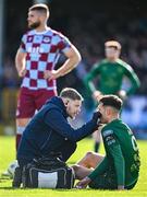 21 April 2025; Mason Melia of St Patrick's Athletic receives medical attention during the SSE Airtricity Men's Premier Division match between Drogheda United and St Patrick's Athletic at Sullivan & Lambe Park in Drogheda, Louth. Photo by Shauna Clinton/Sportsfile