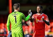 21 April 2025; Mipo Odubeko of Shelbourne and Galway United goalkeeper Brendan Clarke shake hands after the SSE Airtricity Men's Premier Division match between Shelbourne and Galway United at Tolka Park in Dublin. Photo by Sam Barnes/Sportsfile