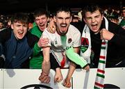 21 April 2025; Cork City supporters celebrate after their side's victory in the SSE Airtricity Men's Premier Division match between Cork City and Waterford at Turners Cross in Cork. Photo by Seb Daly/Sportsfile