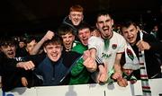 21 April 2025; Cork City supporters celebrate after their side's victory in the SSE Airtricity Men's Premier Division match between Cork City and Waterford at Turners Cross in Cork. Photo by Seb Daly/Sportsfile