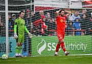 21 April 2025; Sam Bone of Shelbourne reacts to a missed chance as Galway United goalkeeper Brendan Clarke looks on during the SSE Airtricity Men's Premier Division match between Shelbourne and Galway United at Tolka Park in Dublin. Photo by Sam Barnes/Sportsfile