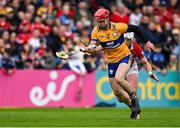 20 April 2025; John Conlon of Clare in action against Patrick Horgan of Cork during the Munster GAA Hurling Senior Championship Round 1 match between Clare and Cork at Zimmer Biomet Páirc Chíosóg in Ennis, Clare. Photo by Brendan Moran/Sportsfile