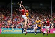 20 April 2025; Eoin Downey of Cork and Peter Duggan of Clare contest a dropping ball during the Munster GAA Hurling Senior Championship Round 1 match between Clare and Cork at Zimmer Biomet Páirc Chíosóg in Ennis, Clare. Photo by Brendan Moran/Sportsfile