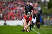 20 April 2025; Mark Coleman of Cork takes a sideline cut during the Munster GAA Hurling Senior Championship Round 1 match between Clare and Cork at Zimmer Biomet Páirc Chíosóg in Ennis, Clare. Photo by Brendan Moran/Sportsfile
