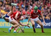 20 April 2025; Alan Connolly of Cork holds off the tackle of Adam Hogan of Clare during the Munster GAA Hurling Senior Championship Round 1 match between Clare and Cork at Zimmer Biomet Páirc Chíosóg in Ennis, Clare. Photo by Brendan Moran/Sportsfile