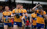 20 April 2025; Tony Kelly and Ian Galvin of Clare put their helmets on before the Munster GAA Hurling Senior Championship Round 1 match between Clare and Cork at Zimmer Biomet Páirc Chíosóg in Ennis, Clare. Photo by Brendan Moran/Sportsfile