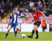 19 April 2025; Nathan Broderick of Ringmahon Rangers FC in action against Killian Cooper of College Corinthians AFC during the FAI Intermediate Cup final match between College Corinthians AFC and Ringmahon Rangers FC at Turners Cross Stadium in Cork. Photo by Michael P Ryan/Sportsfile