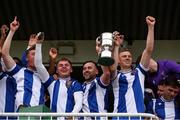 19 April 2025; College Corinthians AFC captain Craig Donnellan, centre, lifts the cup with teammates after their side's victory in the FAI Intermediate Cup final match between College Corinthians AFC and Ringmahon Rangers FC at Turners Cross Stadium in Cork. Photo by Michael P Ryan/Sportsfile